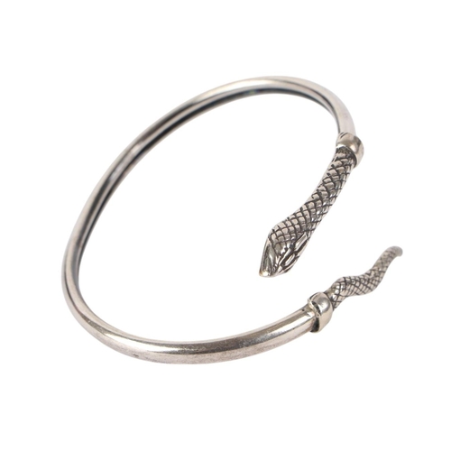 A modern silver torc snake bangle, 6.5cms diameter, 13g.