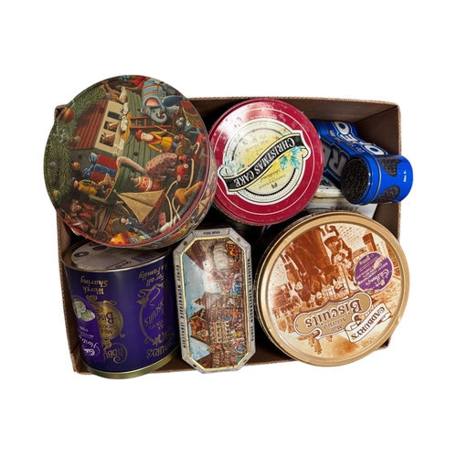 64 - A quantity of modern advertising tins, mostly biscuit tins. (3 boxes)