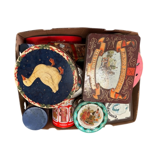 64 - A quantity of modern advertising tins, mostly biscuit tins. (3 boxes)