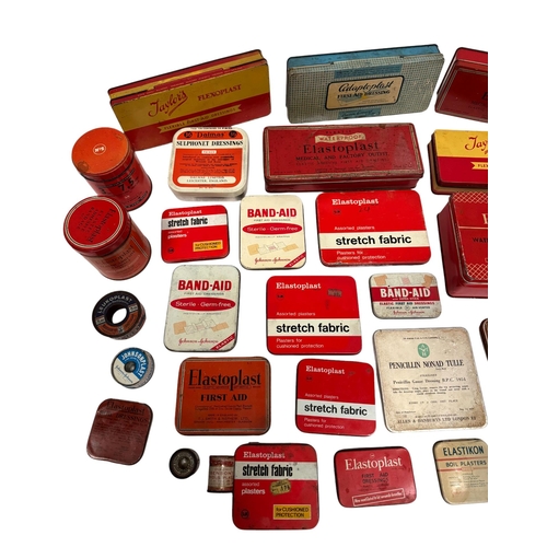 7 - A group of vintage advertising tins, mainly first aid related.