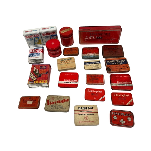 7 - A group of vintage advertising tins, mainly first aid related.