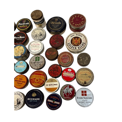 9 - A quantity of vintage advertising tins, mainly tobacco related.