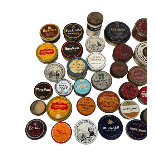 9 - A quantity of vintage advertising tins, mainly tobacco related.