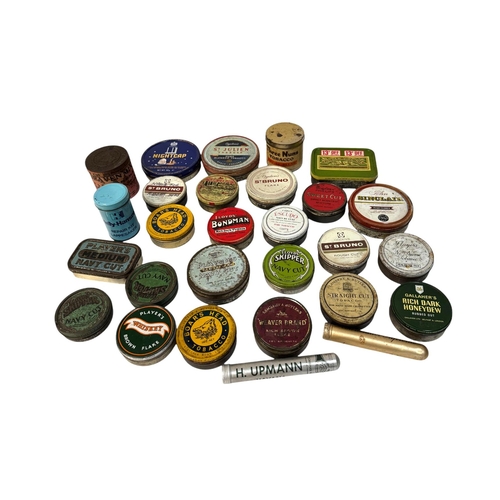 9 - A quantity of vintage advertising tins, mainly tobacco related.