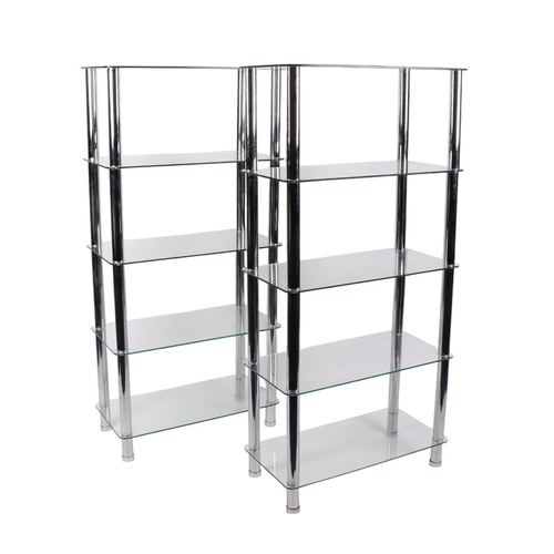 909 - A pair of modern five-tier chrome and clear glass display shelves, 70cms wide (2).