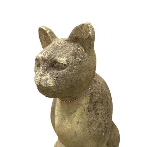 91 - A reconstituted stone figure of a seated cat, approx 53cms high.