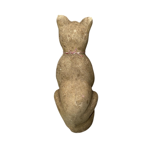 91 - A reconstituted stone figure of a seated cat, approx 53cms high.