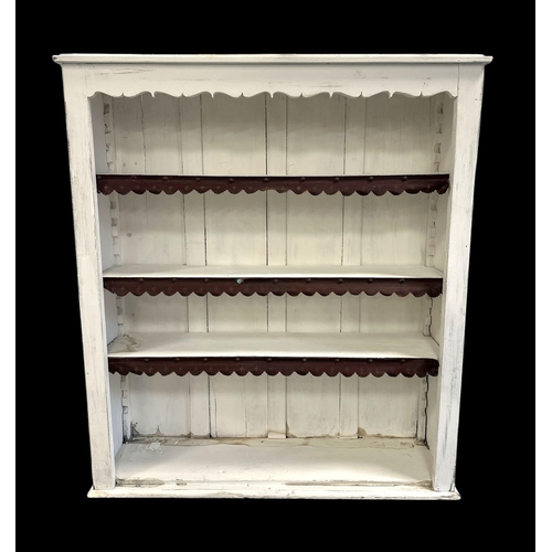 911 - A painted open bookcase with leather trim to the shelves, 98cms wide.