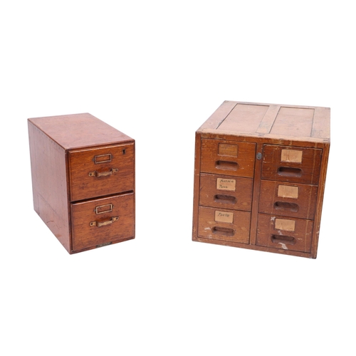 915 - An oak bank of six drawers, 42cms, together with another similar set of two drawers, 24cms wide (2).