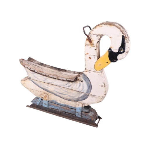 917 - Folk Art.  A carved and painted wooden swan fairground ride, approx 103cms long.