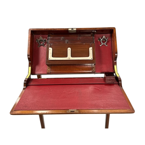 1013 - Military interest.  A late 19th century mahogany folding Campaign desk 'Best London Make', with fitt... 