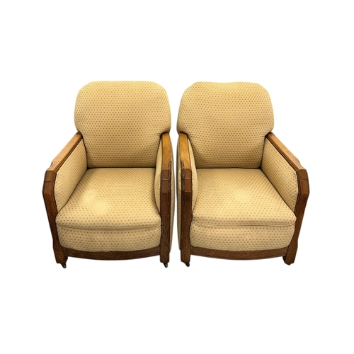 1018 - An Art Deco upholstered three-piece suite with carved show wood, sofa 102cms wide (3).