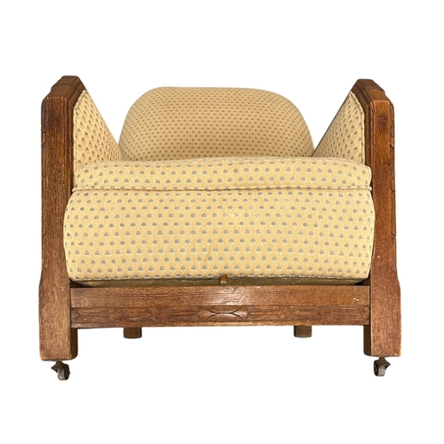 1018 - An Art Deco upholstered three-piece suite with carved show wood, sofa 102cms wide (3).