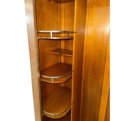 1020 - An Art Deco limed oak gentleman's single wardrobe in the manner of Heals, with fitted interior, 86cm... 