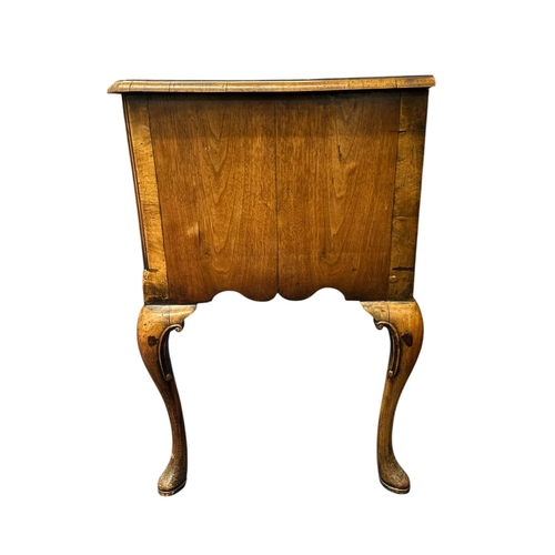 1023 - A 19th century Charles II style walnut sideboard, the crossbanded and quarter veneered top above an ... 