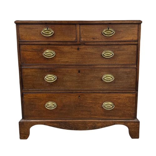 1026 - A 19th century mahogany chest of two short and three graduated long drawers, on bracket feet, 94cms ... 