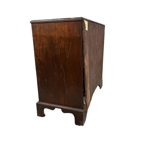 1026 - A 19th century mahogany chest of two short and three graduated long drawers, on bracket feet, 94cms ... 