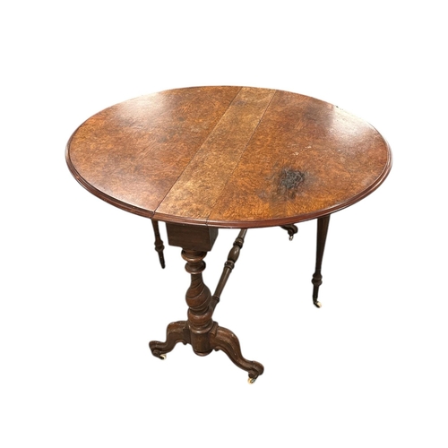 1035 - A Victorian burr walnut Sutherland table, 91cms wide.