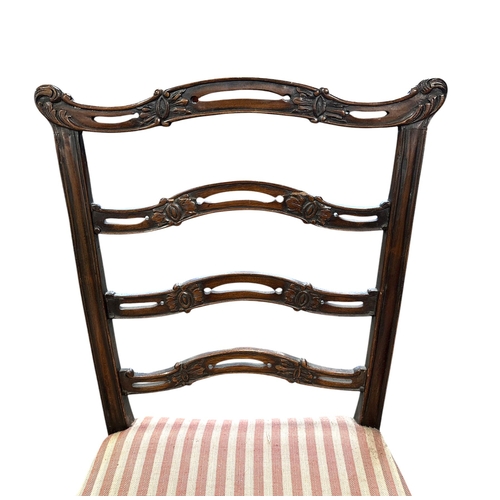 1038 - A pair of George III style mahogany ladder back chairs with upholstered seats, on square chamfered f... 