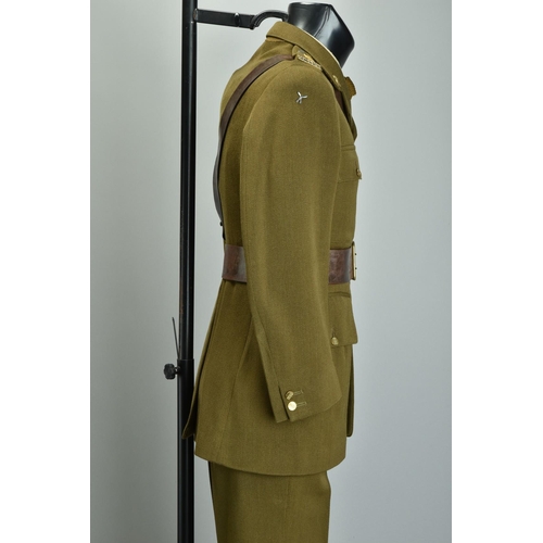 106 - A Service dress uniform; together with a 14th / 20th Hussars Uniform, an Officers' 1980s bespoke tai... 