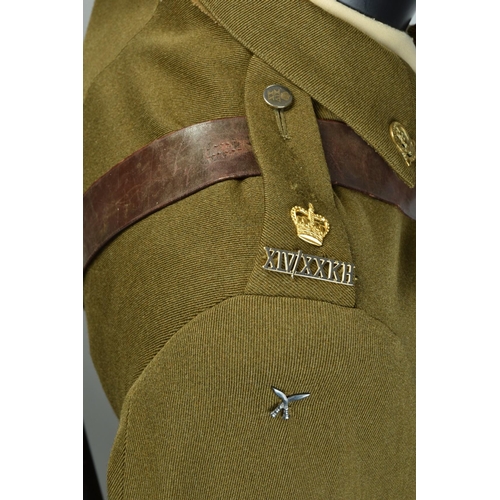 106 - A Service dress uniform; together with a 14th / 20th Hussars Uniform, an Officers' 1980s bespoke tai... 