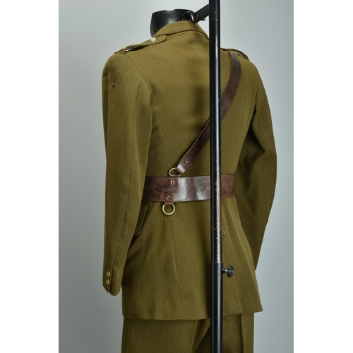 106 - A Service dress uniform; together with a 14th / 20th Hussars Uniform, an Officers' 1980s bespoke tai... 