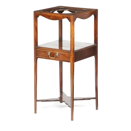 1083 - A George III mahogany square washstand, inlaid with boxwood stringing, the top pierced with three wa... 