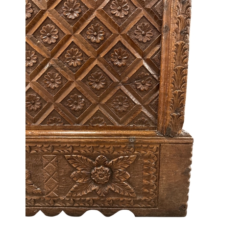 1086 - A late 18th / early 19th century continental carved walnut Cassone of large proportions, the front p... 