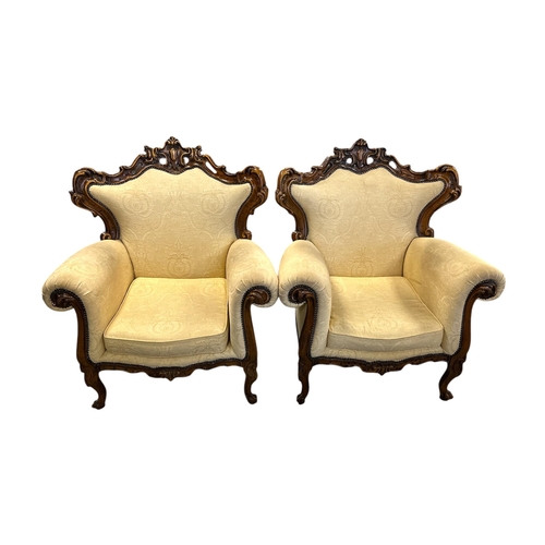 1090 - A continental carved walnut and upholstered three-piece suite in the French taste, each piece with s... 