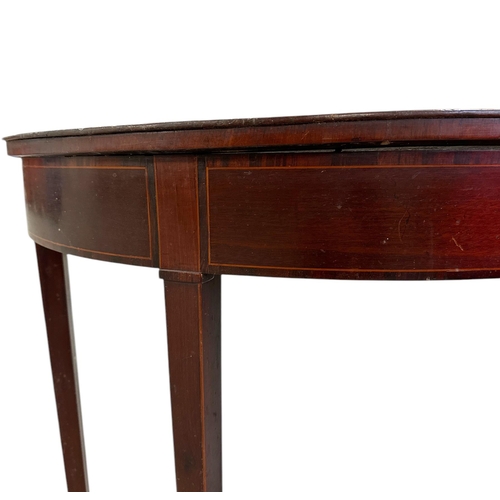 1091 - A 19th century mahogany demi-lune table on square tapering legs, 95cms wide.