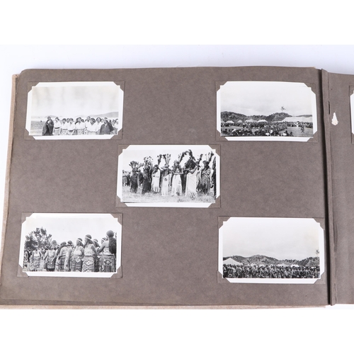 11 - An early 20th century photograph album containing New Zealand and South Sea Islands and military pho... 