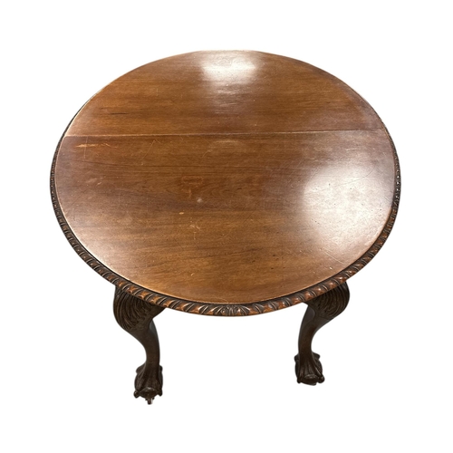 1109 - A late 19th / early 20th century D-end extending walnut dining table with one extra leaf, on cabriol... 