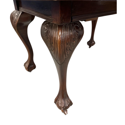 1109 - A late 19th / early 20th century D-end extending walnut dining table with one extra leaf, on cabriol... 