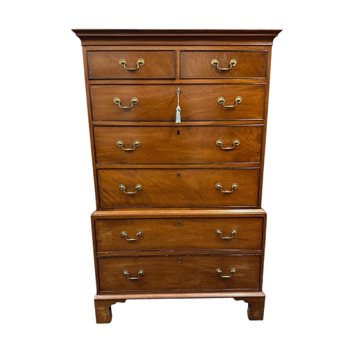 1123 - A 19th century mahogany chest-on-chest with two short and five graduated long drawers, on bracket fe... 