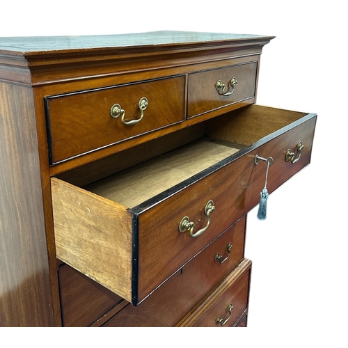 1123 - A 19th century mahogany chest-on-chest with two short and five graduated long drawers, on bracket fe... 