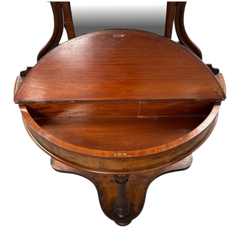 1129 - A Victorian mahogany demi-lune Duchess dressing table, 108cms wide.