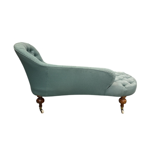 1132 - A Victorian button back chaise longue, 167cms long.