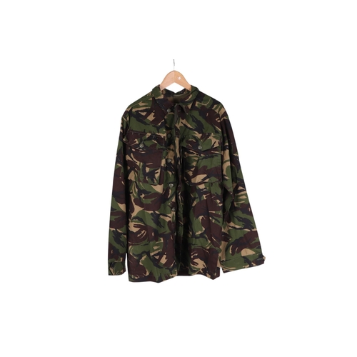 127 - A British Army Cold War era issue uniform, lightweight trousers, soldier 95 DPM camouflage shirt and... 