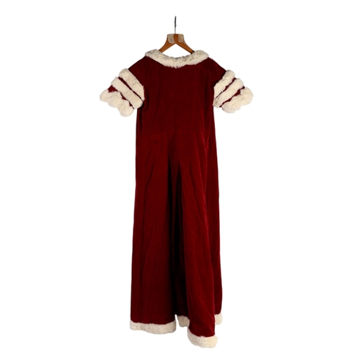 147 - A Peers Coronation robe in red velvet with ermine trim consisting of coat and train, possibly for a ... 