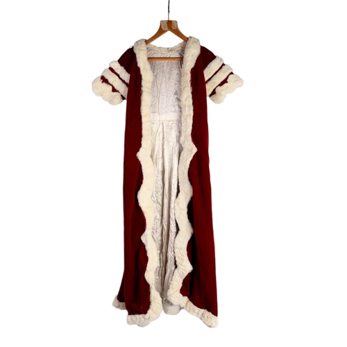 147 - A Peers Coronation robe in red velvet with ermine trim consisting of coat and train, possibly for a ... 