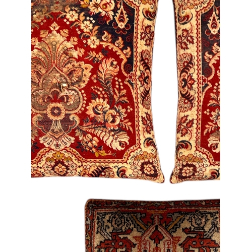 149 - Three Turkish carpet cushions, the largest 48cms wide (3).