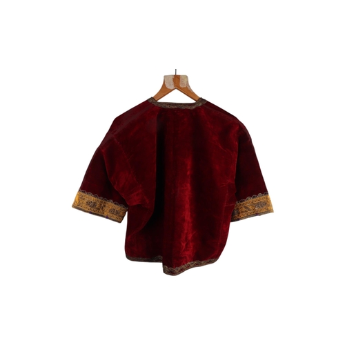 166 - A red velvet short jacket with gold and silver bullion wire work.