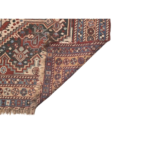 169 - A Persian Heriz woollen hand knotted rug, 150 by 195cms.