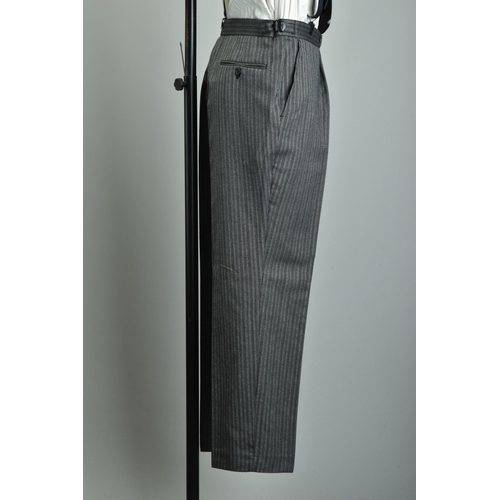 216 - Morning Dress.  A large gentleman's tailcoat waistcoat & striped trousers (ref: XFP).