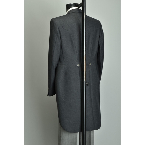 218 - Morning dress suit.  A gentleman's grey tailcoat, patterned trousers & waistcoat (ref: VVF). Conditi... 