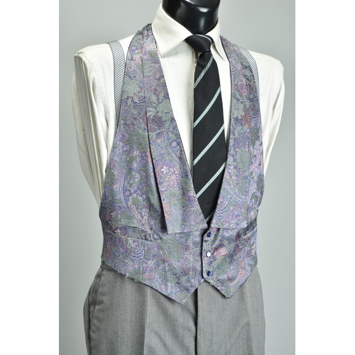 218 - Morning dress suit.  A gentleman's grey tailcoat, patterned trousers & waistcoat (ref: VVF). Conditi... 