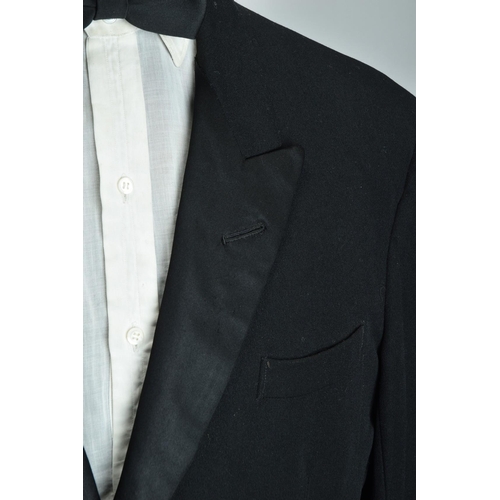 220 - A 1968 Savile Row bespoke tailored well-weathered satin-faced dinner jacket (ref: JRU).