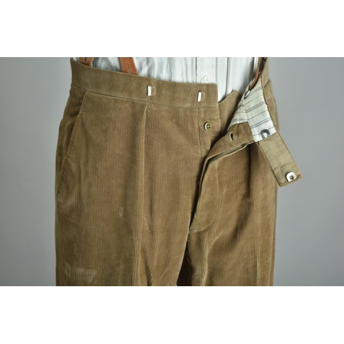 228 - A pair of traditional corduroy trousers; together with a pair of Cordings corduroy trousers, very ta... 