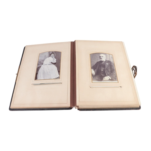 30 - A Victorian photo album containing family photos and carte de visite.