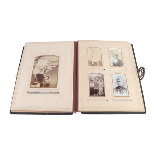 30 - A Victorian photo album containing family photos and carte de visite.